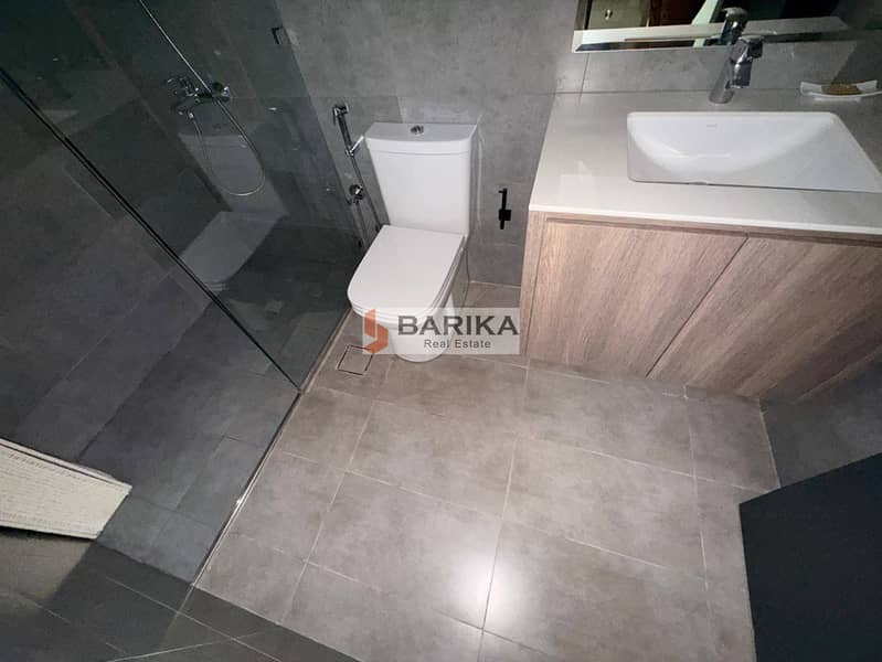 Modern Furnished 1-Bedroom Apartment | Building 88 - Image 9