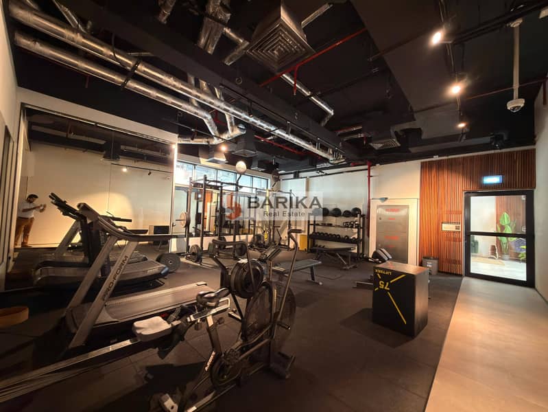 Modern Furnished 1-Bedroom Apartment | Building 88 - Image 12