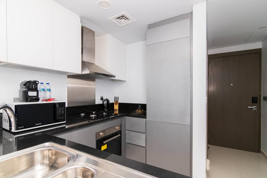 Fully furnished | 1BHK Rented | Full Canal View | Burj Khalifa view | High floor | Ready investor deal | Motivated seller - Image 14