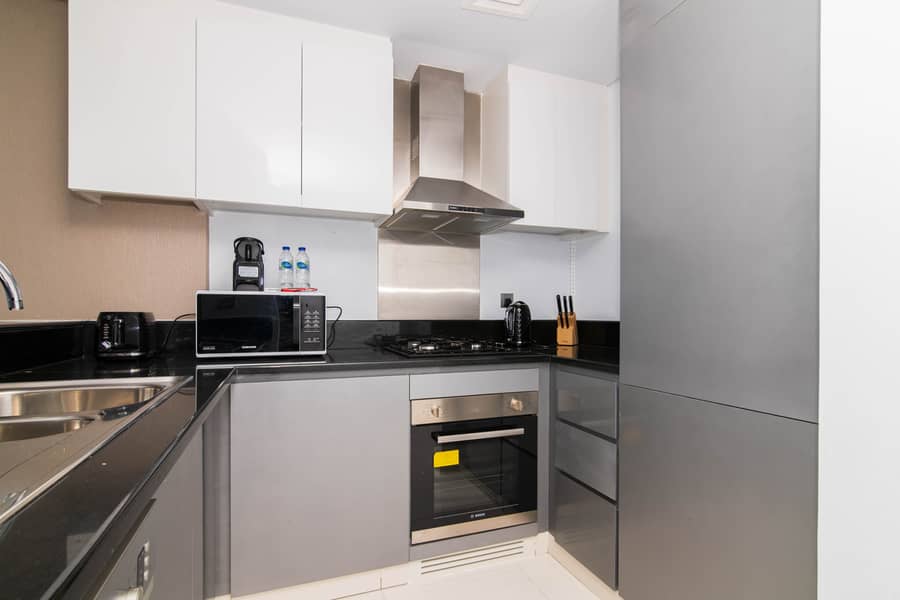 Fully furnished | 1BHK Rented | Full Canal View | Burj Khalifa view | High floor | Ready investor deal | Motivated seller - Image 16