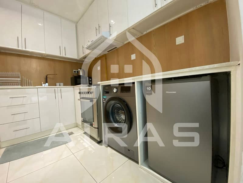 Charming Furnished Studio in JVC - Image 8