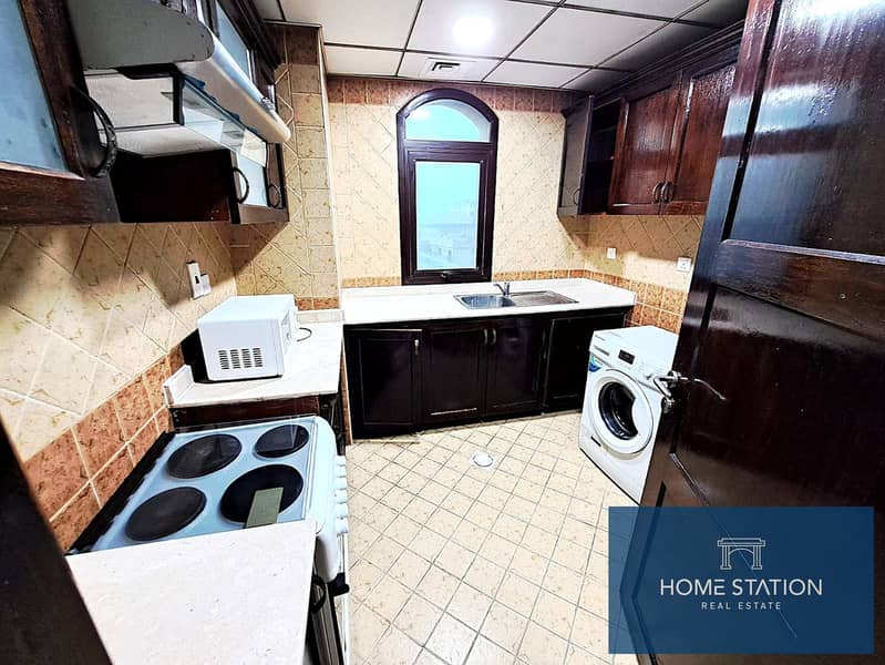 Furnished 1BR Apartment With Balcony | Near MOE - Image 7