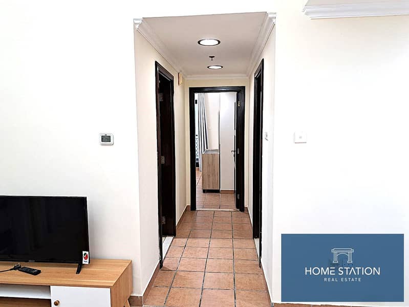 Furnished 1BR Apartment With Balcony | Near MOE - Image 8