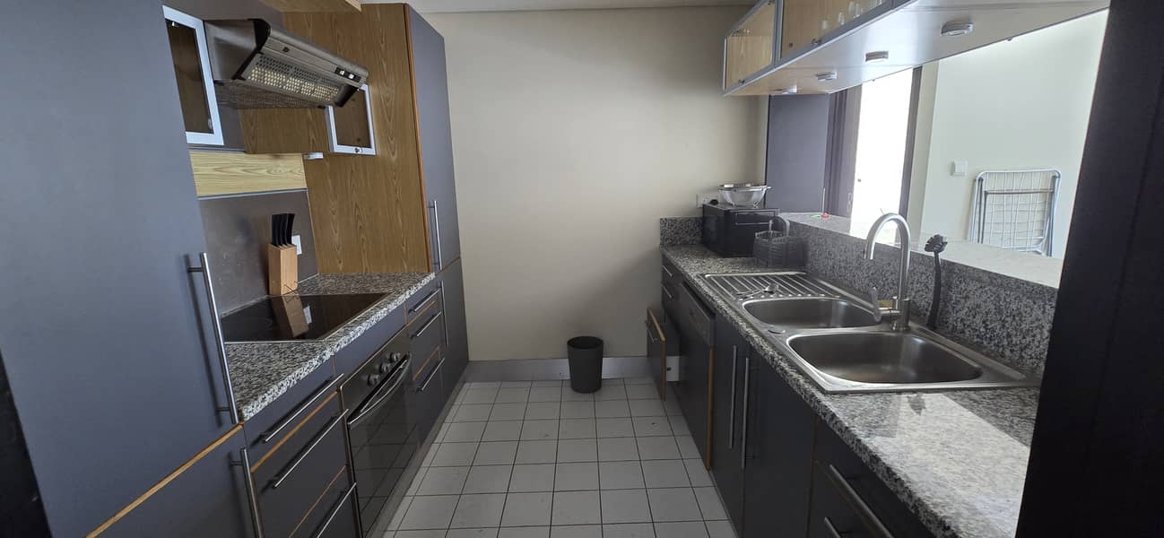 Large Upgraded Semi-furnished 1 Bedroom + Store - Image 11