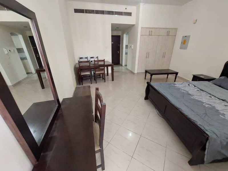 ALREADY RENTED - FURNISHED STUDIO WITH RESERVED PARKING - CBD BUILDING !