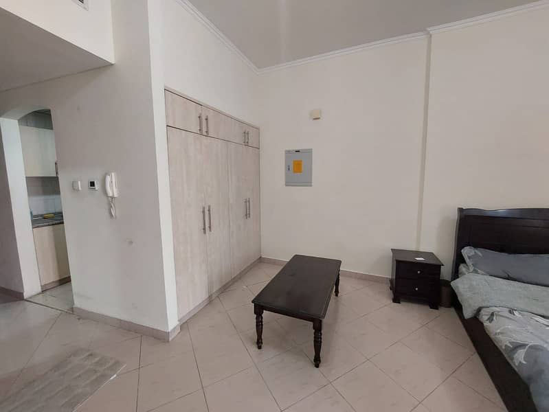 ALREADY RENTED - FURNISHED STUDIO WITH RESERVED PARKING - CBD BUILDING ! - Image 6
