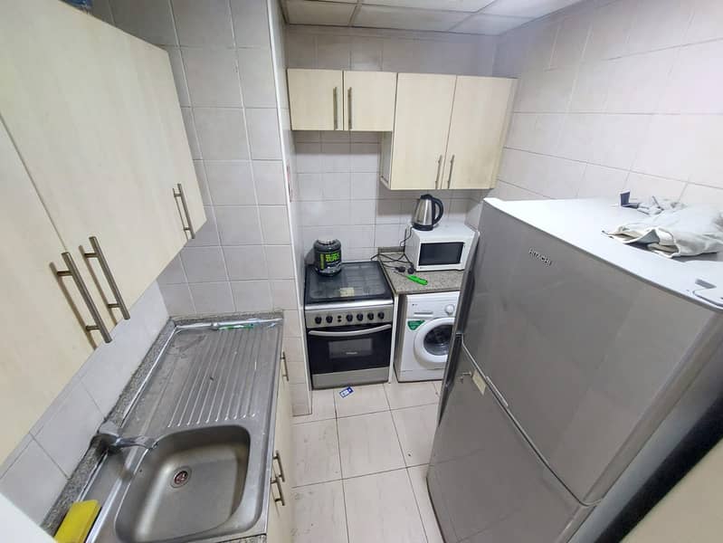 ALREADY RENTED - FURNISHED STUDIO WITH RESERVED PARKING - CBD BUILDING ! - Image 11