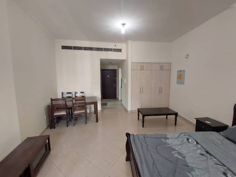 ALREADY RENTED - FURNISHED STUDIO WITH RESERVED PARKING - CBD BUILDING ! - Image 12