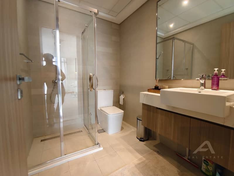 VASTU Compliant | 1 Bedroom Fully Furnished | Canal & Pool View | Azizi Riviera 7 - Image 12