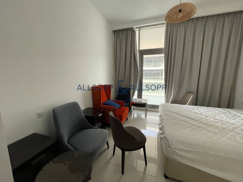 Sleek 2BR Apartment at Golf Promenade, Damac Hills - Image 6