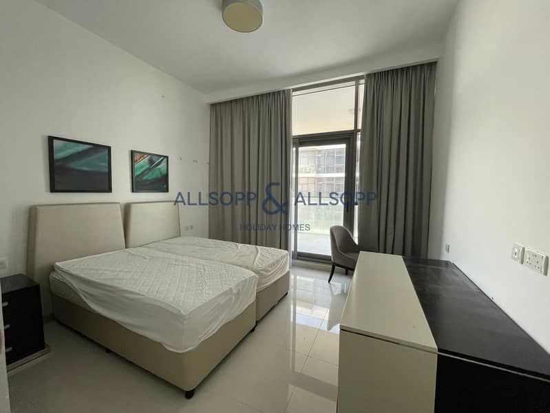 Sleek 2BR Apartment at Golf Promenade, Damac Hills - Image 8