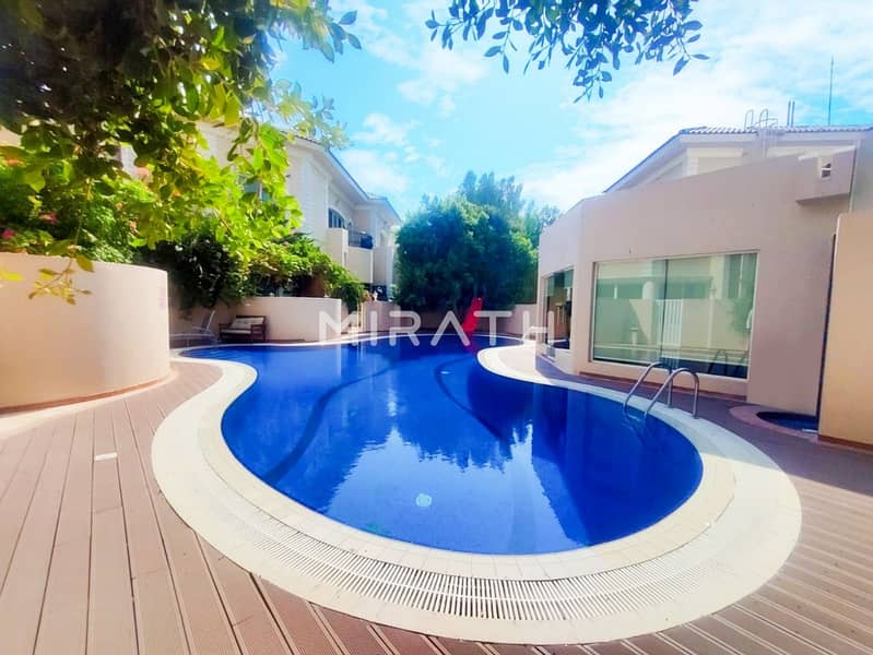 Elegant 5BR + maid's room | Shared Pool | Garden - Image 12