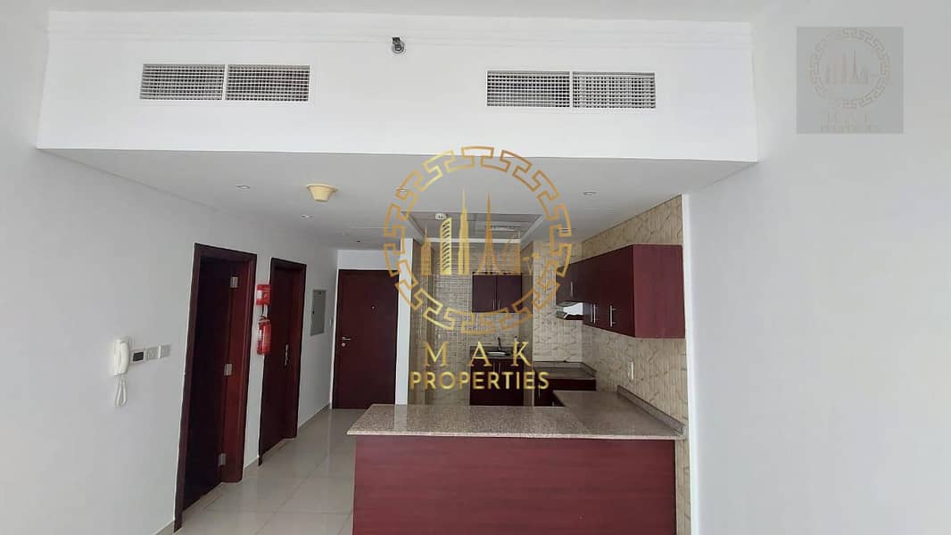 Oasis Tower 1 | Dubai Sports City | Serene Canal View | 855 sq. ft.