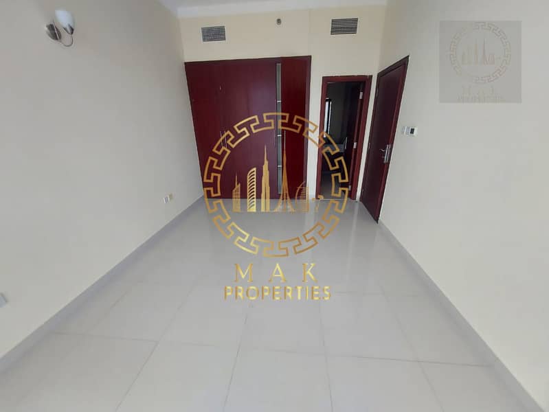 Oasis Tower 1 | Dubai Sports City | Serene Canal View | 855 sq. ft.