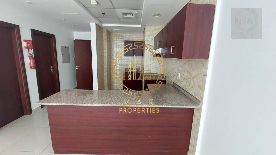 Oasis Tower 1 | Dubai Sports City | Serene Canal View | 855 sq. ft.