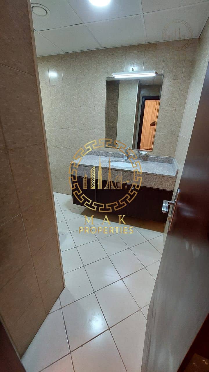 Oasis Tower 1 | Dubai Sports City | Serene Canal View | 855 sq. ft. - Image 6