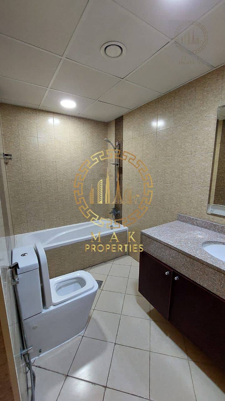 Oasis Tower 1 | Dubai Sports City | Serene Canal View | 855 sq. ft. - Image 7