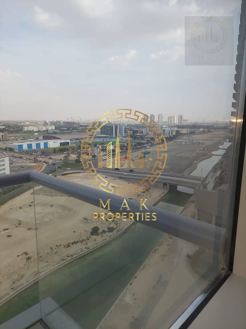 Oasis Tower 1 | Dubai Sports City | Serene Canal View | 855 sq. ft. - Image 12