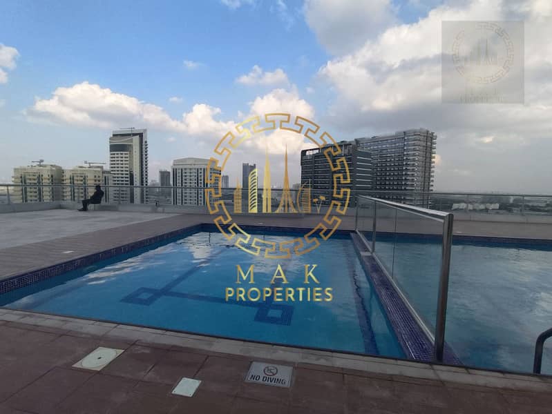 Oasis Tower 1 | Dubai Sports City | Serene Canal View | 855 sq. ft. - Image 14