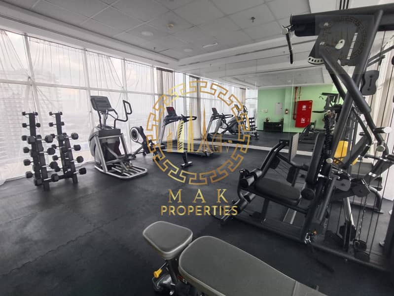 Oasis Tower 1 | Dubai Sports City | Serene Canal View | 855 sq. ft. - Image 15