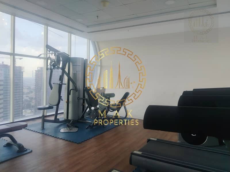 Oasis Tower 1 | Dubai Sports City | Serene Canal View | 855 sq. ft. - Image 10