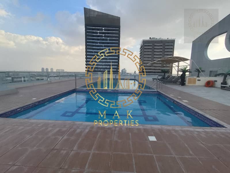 Oasis Tower 1 | Dubai Sports City | Serene Canal View | 855 sq. ft. - Image 17