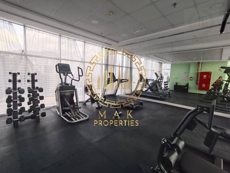 Oasis Tower 1 | Dubai Sports City | Serene Canal View | 855 sq. ft. - Image 18