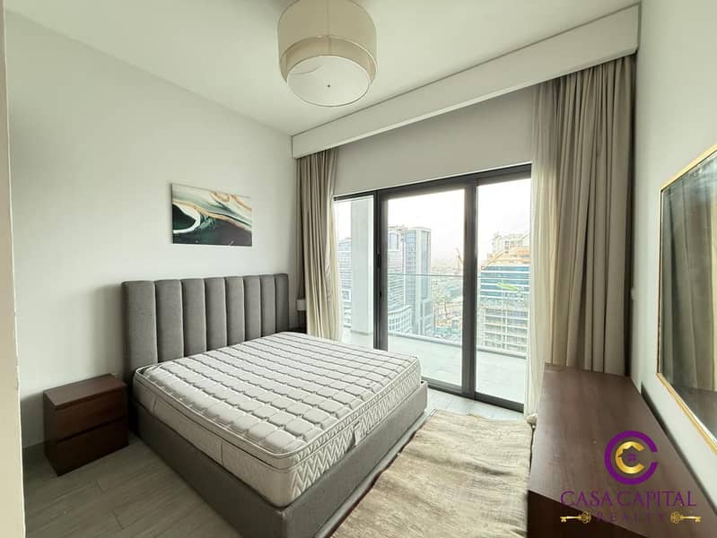 Fully Furnished 2BR | Bigger Layout | Burj & Community View | Prime Location - Image 9