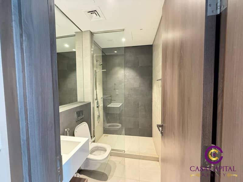 Fully Furnished 2BR | Bigger Layout | Burj & Community View | Prime Location - Image 11