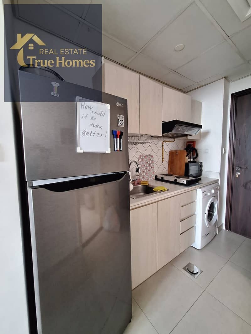 Discover comfortable living in this well-maintained studio apartment located in the popular Midtown by Deyaar