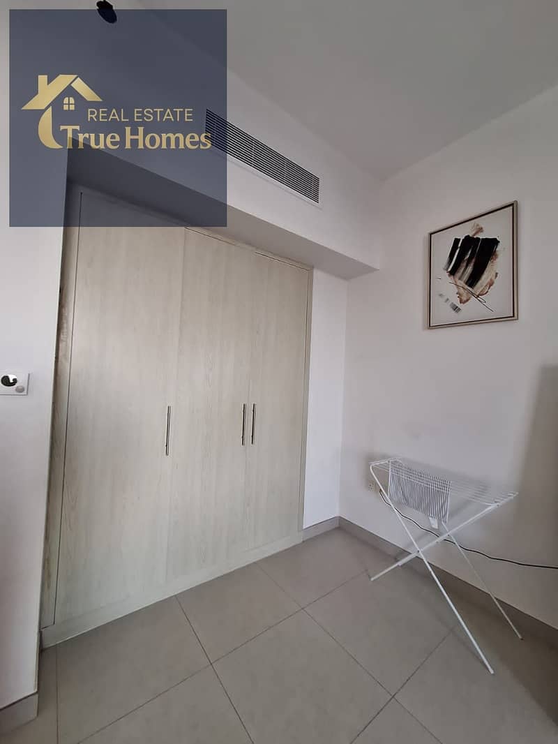 Discover comfortable living in this well-maintained studio apartment located in the popular Midtown by Deyaar - Image 6