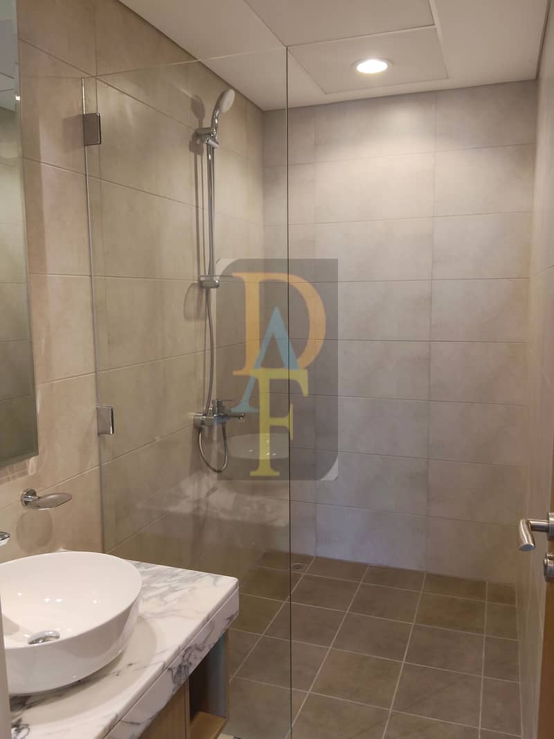 BRAND NEW 2B/R WITH BALCONY WITH RESERVED PARKING SPACE FOR RENT - Image 11