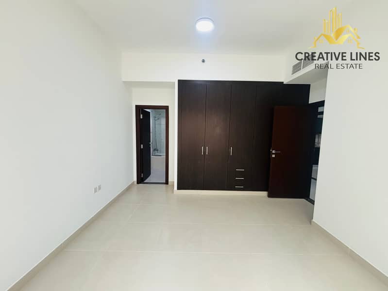 Spacious 2BHK with Maid Room | Gym, Pool & Parking | Near Pond Park