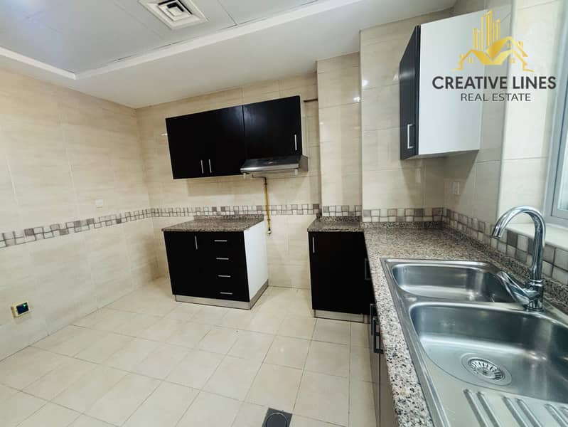 Spacious 2BHK with Maid Room | Gym, Pool & Parking | Near Pond Park - Image 9