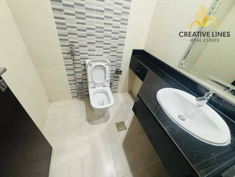 Spacious 2BHK with Maid Room | Gym, Pool & Parking | Near Pond Park - Image 13