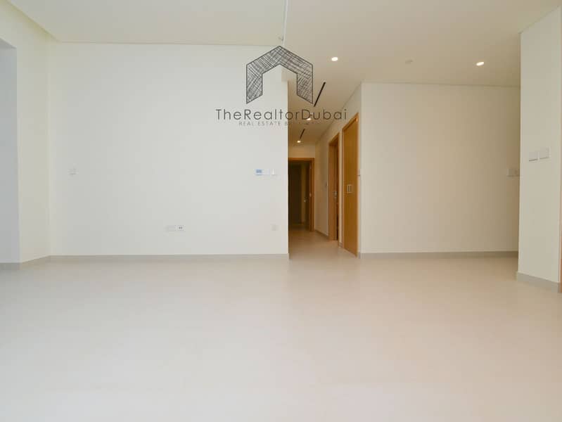 Ultra-Private Podium-Level Unit with Secluded Balcony