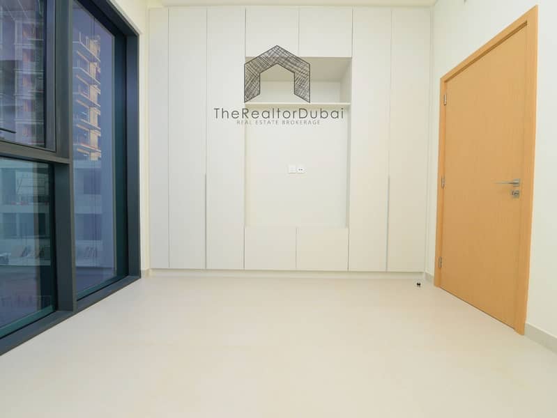 Ultra-Private Podium-Level Unit with Secluded Balcony