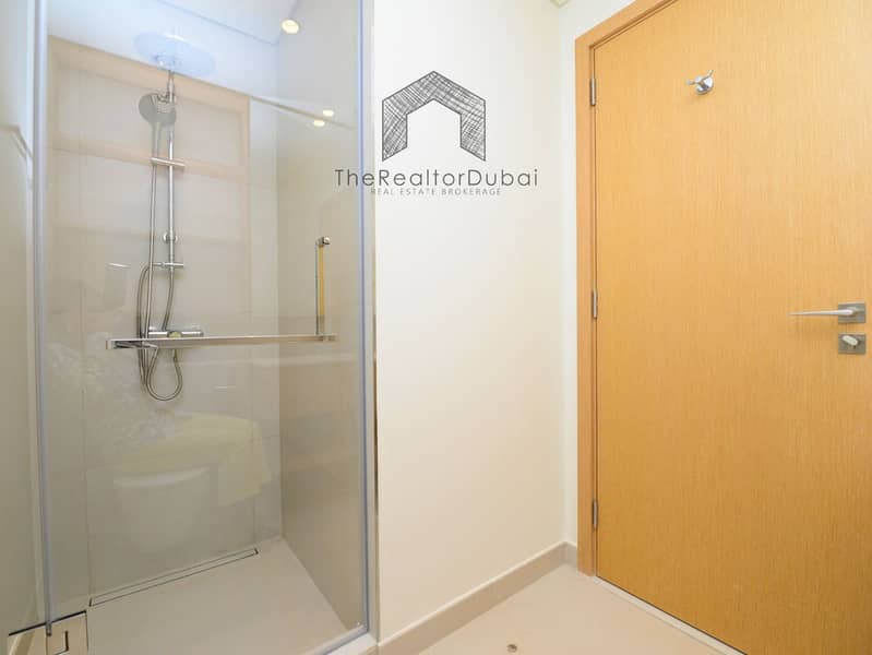 Ultra-Private Podium-Level Unit with Secluded Balcony - Image 9