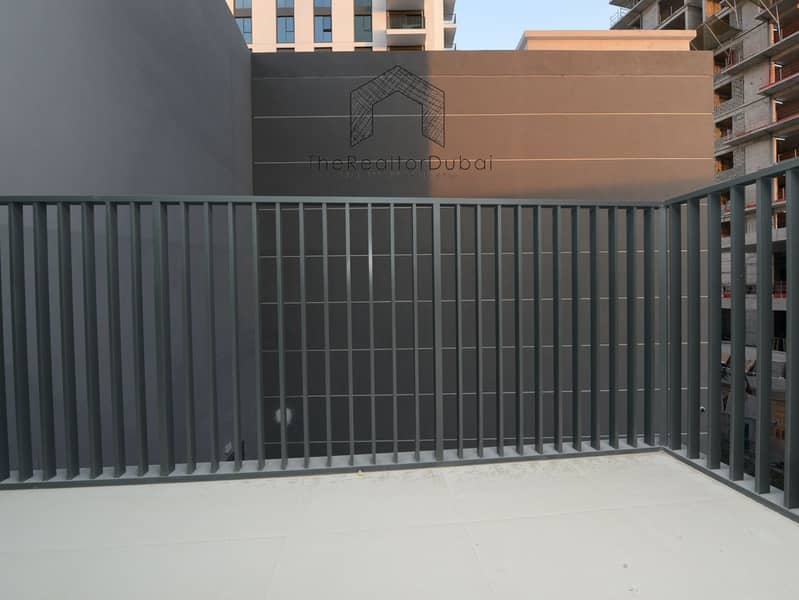 Ultra-Private Podium-Level Unit with Secluded Balcony - Image 11