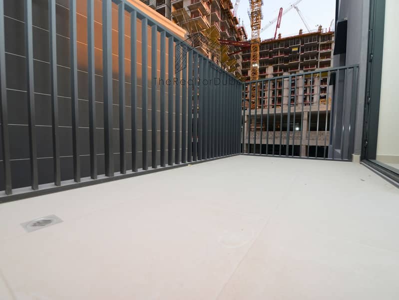 Ultra-Private Podium-Level Unit with Secluded Balcony - Image 12