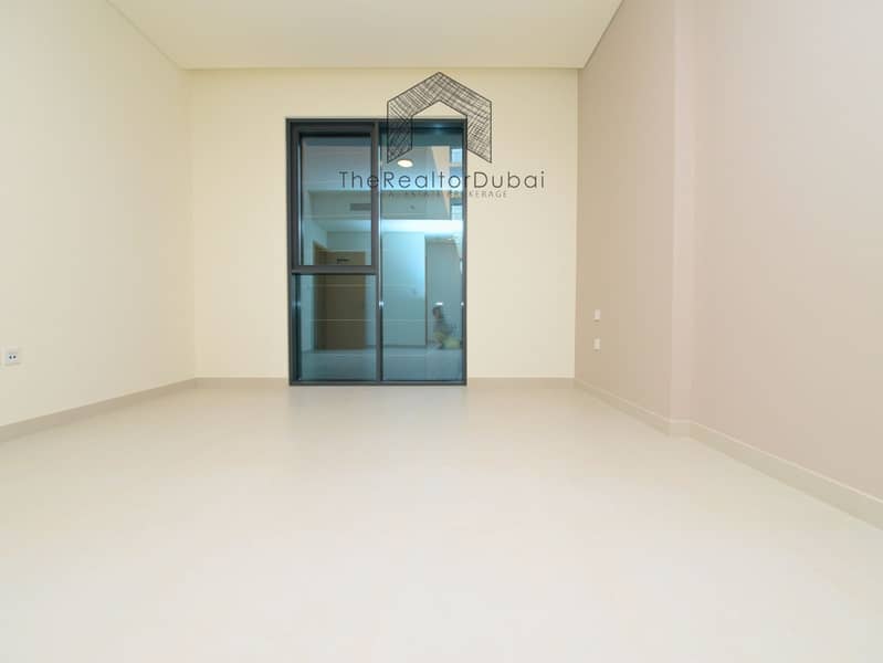 Ultra-Private Podium-Level Unit with Secluded Balcony - Image 14