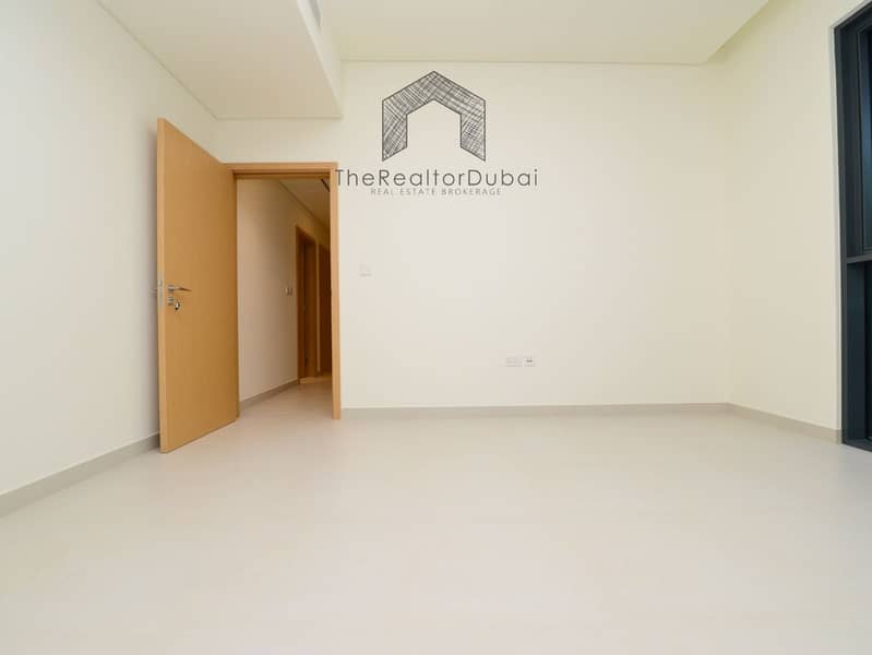 Ultra-Private Podium-Level Unit with Secluded Balcony - Image 19