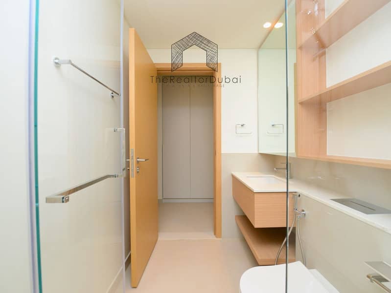 Ultra-Private Podium-Level Unit with Secluded Balcony - Image 21