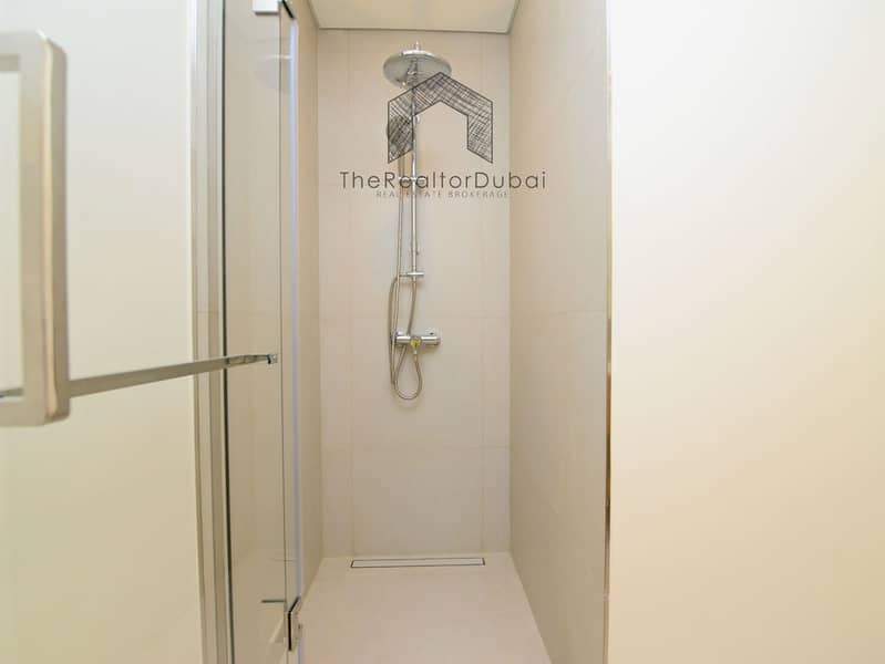 Ultra-Private Podium-Level Unit with Secluded Balcony - Image 22