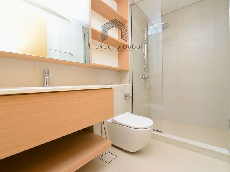 Ultra-Private Podium-Level Unit with Secluded Balcony - Image 23
