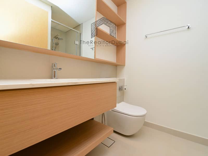 Ultra-Private Podium-Level Unit with Secluded Balcony - Image 24
