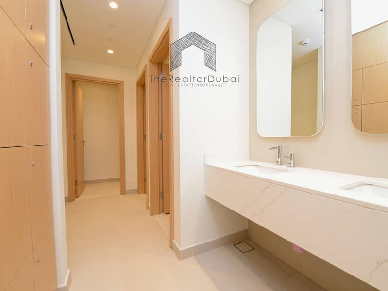 Ultra-Private Podium-Level Unit with Secluded Balcony - Image 25