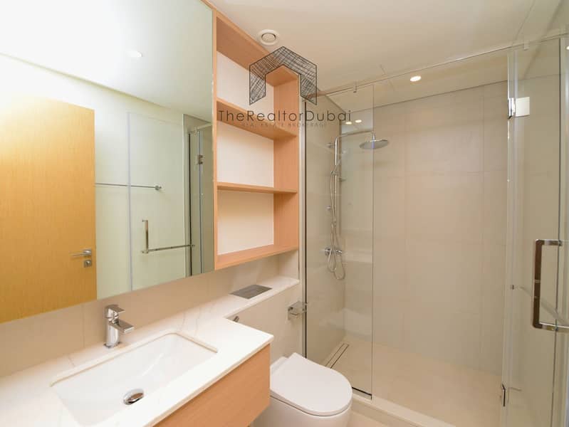 Ultra-Private Podium-Level Unit with Secluded Balcony - Image 27