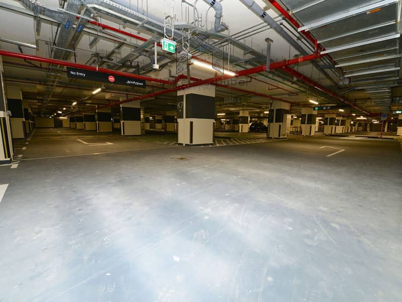 Ultra-Private Podium-Level Unit with Secluded Balcony - Image 45