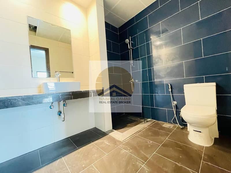 "Exquisite 1-Bedroom Apartment: Luxury Living in Nad al Hammar" - Image 11